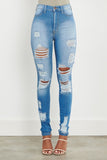 Uptown Chic Ripped Jeans