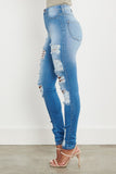 Uptown Chic Ripped Jeans